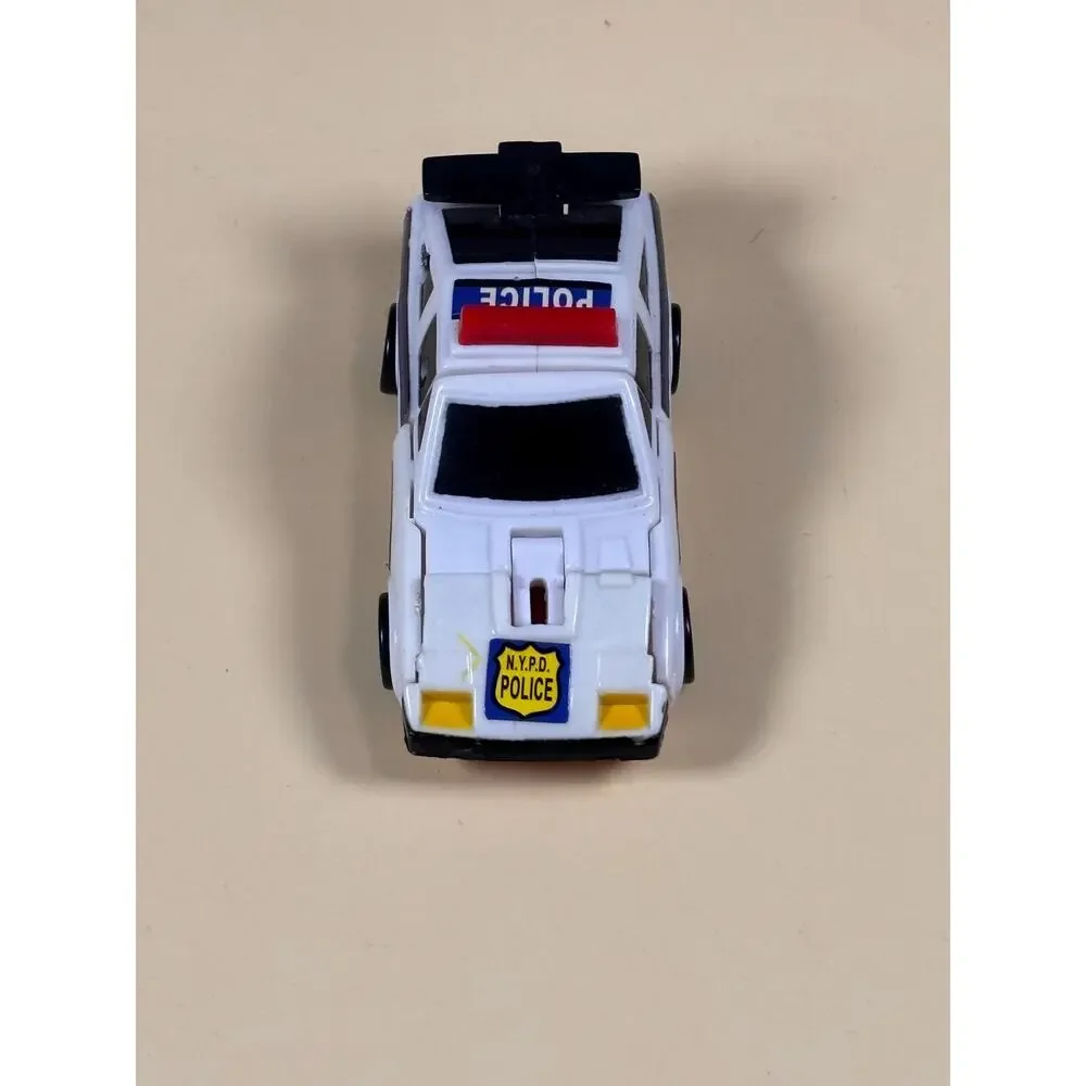 Vintage Transformers G1 Defensor KO Knockoffs NYPD Police Car Figure 1986